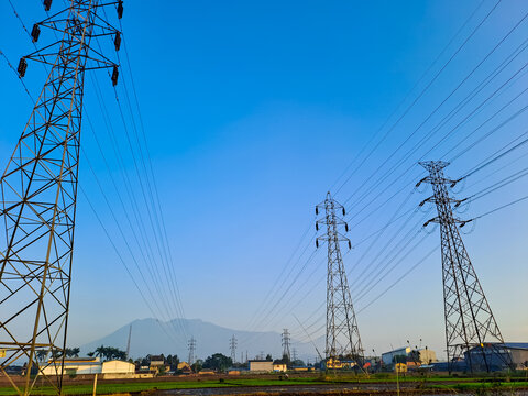 Extra high voltage air channels under clear blue background