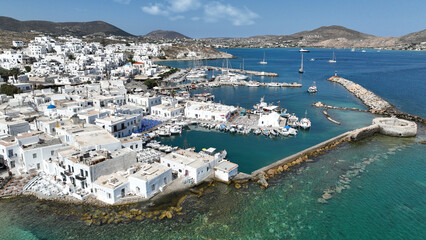 Aerial drone photo of picturesque small seaside village of Naoussa with traditional Cycladic character, Paros island, Cyclades, Greece