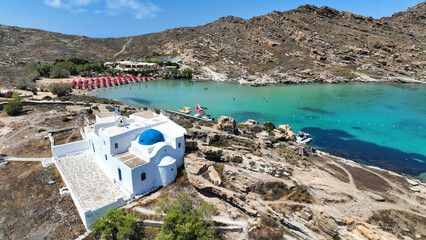 Aerial drone photo of famous small organised beach of Monastiri in the gulf of Naousa, Paros island, Cyclades, Greece