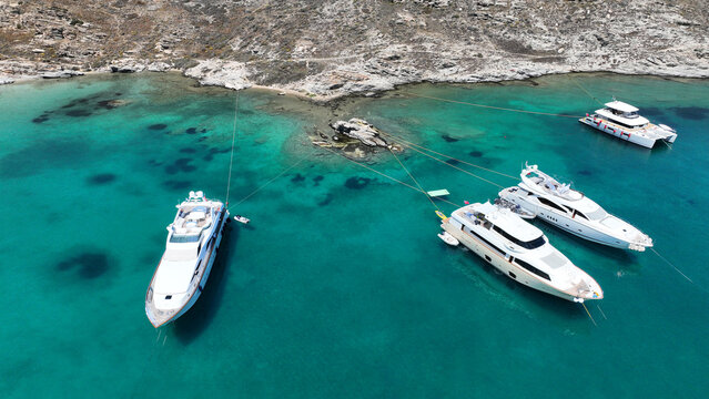 Aerial drone photo of famous small organised beach of Monastiri in the gulf of Naousa, Paros island, Cyclades, Greece