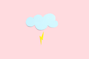 Paper cloud with lightning on pink background. Weather forecast concept