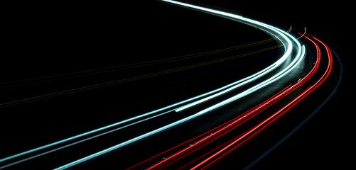 lights of cars driving at night. long exposure