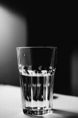 Large opaque glass with clean water black and white photo