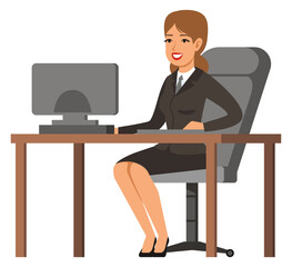 Happy businesswoman at workplace. Woman in suit siiting at desk