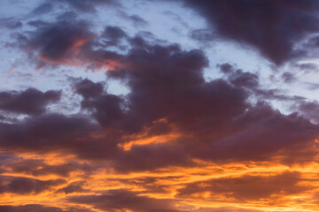 Naklejka na ściany i meble Real amazing sunrise or sunset sky with gentle colorful clouds