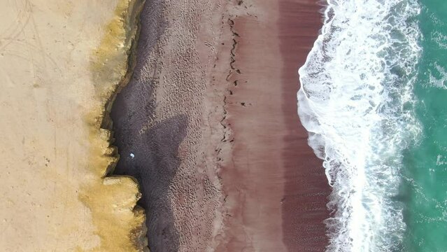 paracas national park close to lima: desert landscape with red beach- the famous playa roja