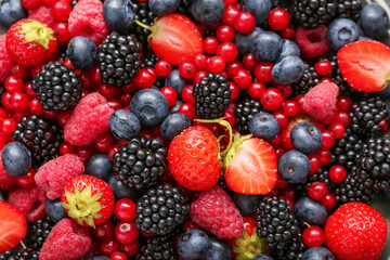 Different fresh berries as background, closeup