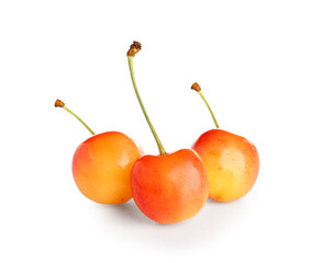 Sweet yellow cherries on white background