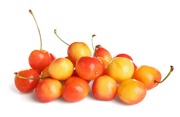 Heap of sweet yellow cherries on white background