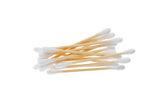Many wooden cotton buds isolated on white