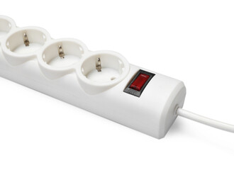 Power strip with switch button on white background, closeup