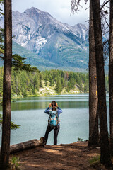 Johnson Lake Alberta Canada - Young Woman taking a picture with her phone