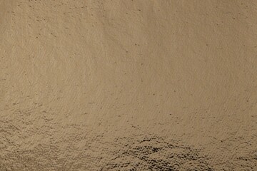 Edible gold leaf sheet as background, closeup