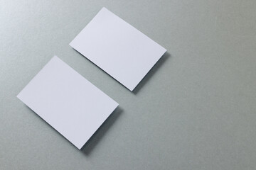 White business cards with copy space on grey background