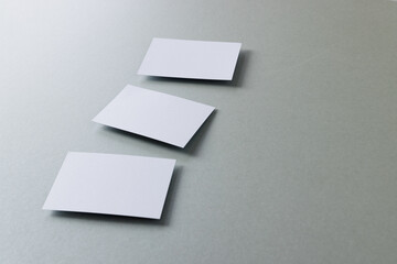 White business cards with copy space on grey background