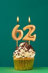 Birthday candle number 62 - Vertical anniversary card with green background