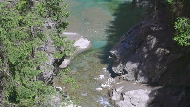 Mountain river entering the lake. Hinterrhein river and Lai da Seara Lake, B&auml;renburg reservoir. Exit of the famous Rofla Gorge, Rofflaschlucht. Andeer, Canton of Graub&uuml;nden in Switzerland