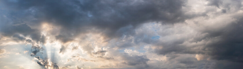 Dramatic panorama sky with storm cloud on a cloudy day. Panoramic image.