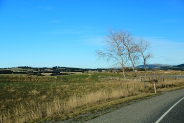 Fototapeta na wymiar Breathtaking landscape during roadtrip with campervan from Te Anau to Dunedin, New Zealand.