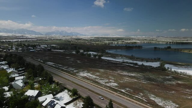 Aerial video shots of Arvada, Colorado near Standley Lake after a late spring snowstorm.  4K footage at 24fps 3840 x 2160.