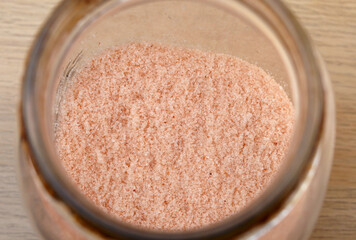 Top view of himalayan salt or pink salt on the jar