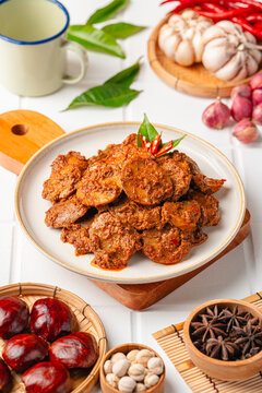 Rendang Jengkol, dogfruit simmered in spices and coconut milk. Indonesian traditional comfort food, with a spicy savory taste typical of rendang and a legit jengkol texture.