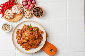 Rendang Jengkol, dogfruit simmered in spices and coconut milk. Indonesian traditional comfort food, with a spicy savory taste typical of rendang and a legit jengkol texture.