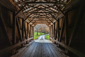 Looking through a wooden covered bridge