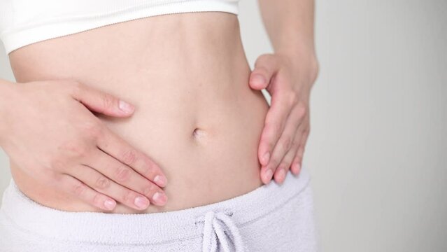 Animation of a woman's waist and stomach area of a successful diet and other bright images Stroking No face