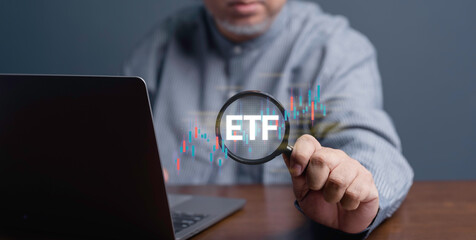 Exchange Traded Fund ( ETF ). Financial Success in the Stock Market Businessman Trading on Exchange, Investment Opportunities in Mutual Funds and ETFs, Growing Wealth in the Financial Market.