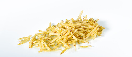 Fast food.Bunch of french fries with dill on white background