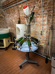 in a sparkling wine cellar there is a machine that is used to determine the sweetness of sparkling wines