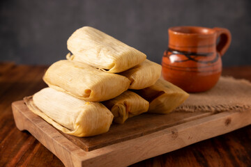 Tamales. Prehispanic dish typical of Mexico and some Latin American countries. Corn dough wrapped in corn leaves. The tamales are steamed.