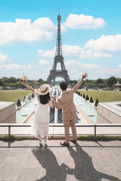 Lovely Asian couple is enjoy traveling at Paris, France.