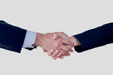 握手するビジネスシーンの男女