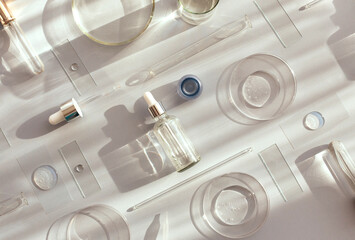 serum in petri dishes on light background cosmetic research concept