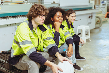 Obraz premium group of people worker multiracial sitting relax rest brake together friend in modern factory vintage color tone