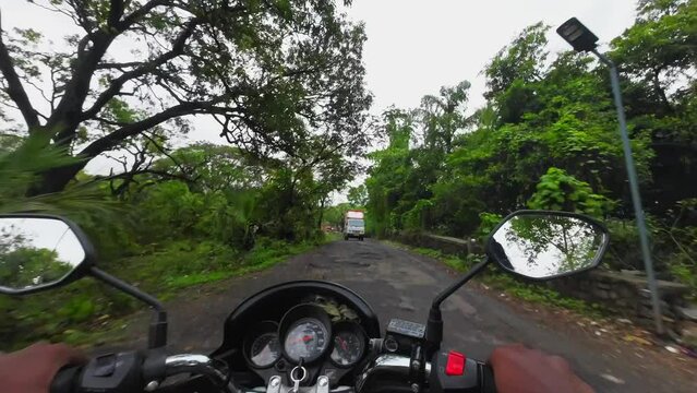 bike ride in raining on construction road aarey colnoy to powai wide view.