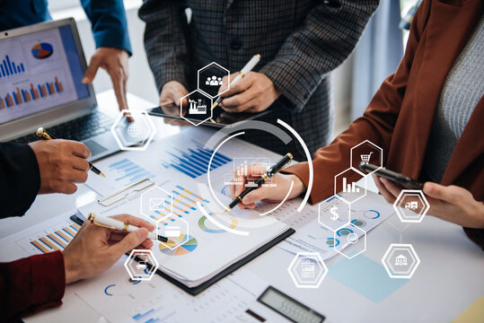 Co working team meeting concept,business with smart phone and laptop and digital tablet computer in office with virtual interface icons