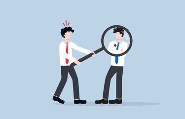 Fototapeta premium Analyzing competitor in marketing, understanding strength and weakness of competitor to develop effective strategy concept, Businessman seeing black spot on competitor body through magnifier.