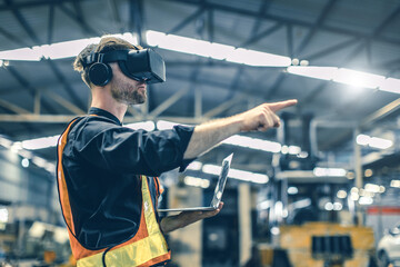 Engineer male using VR virtual reality technology in modern warehouse factory new innovation...
