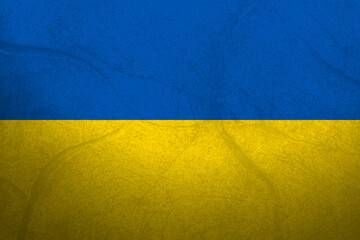 Ukrainian flag with grunge texture overlay. Colors of the Ukrainian national flag - blue and yellow.