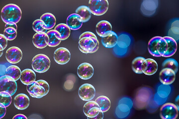Rainbow soap bubbles from the bubble blower. for abstract background usage.
