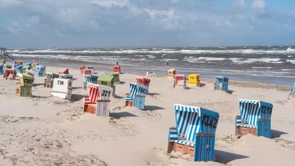 Foto op Canvas Strandkörbe stehen am Strand © Bjoern Kanka