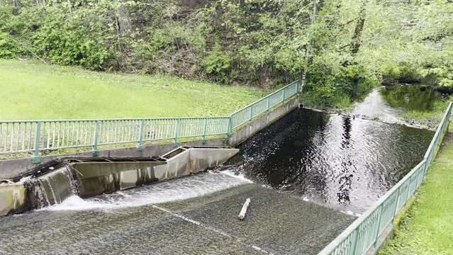 Spillway at the dam on Welcome Lake flowing into Colin Creek in Redmond, Washington