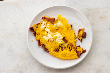  A plate of eggs with sausage. Breakfast time.