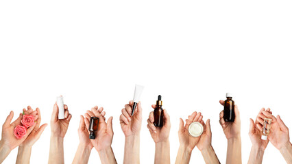 Female caucasian hands hold beauty cosmetisc products on transparent background