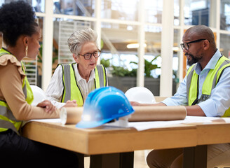 Meeting, planning and engineering people with blueprint for teamwork, collaboration and construction ideas. Project management, floor plan and manager, women and man talking of sketch in architecture