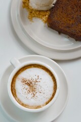 closeup hot cappuccino coffee on white background