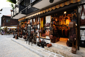 Fototapeta na wymiar Souvenir leather bags shop in the old town of Nessebar.